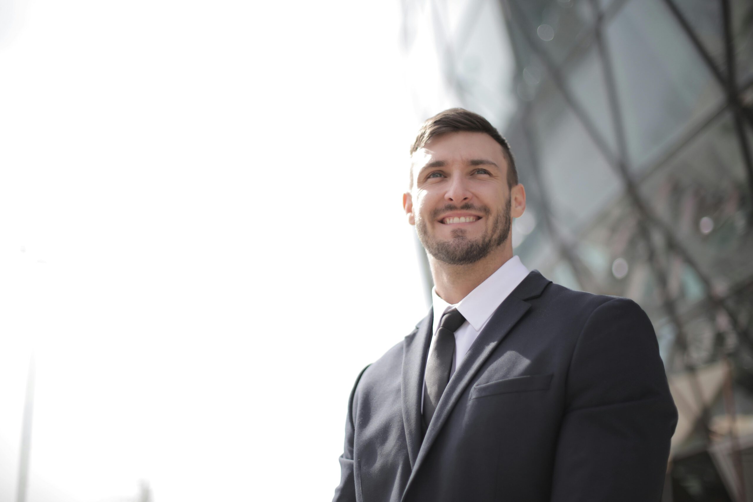 Man in Black Suit Jacket Smiling